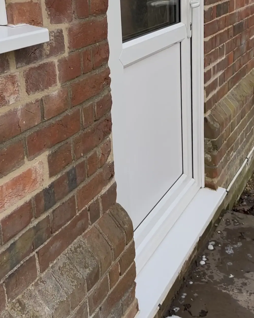 After: the same door and frame clean and white