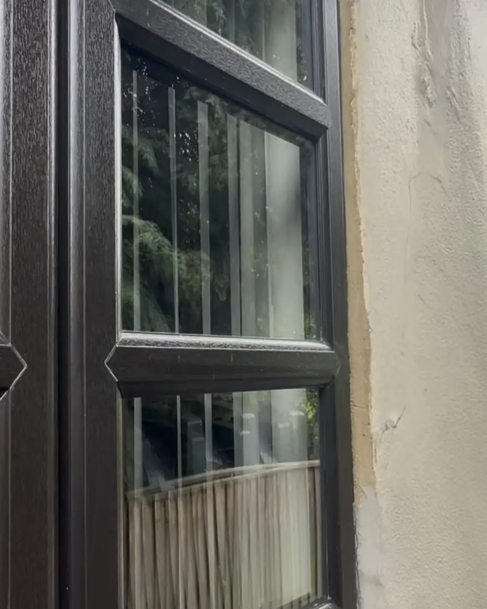 After: the same window with clean glass and frames